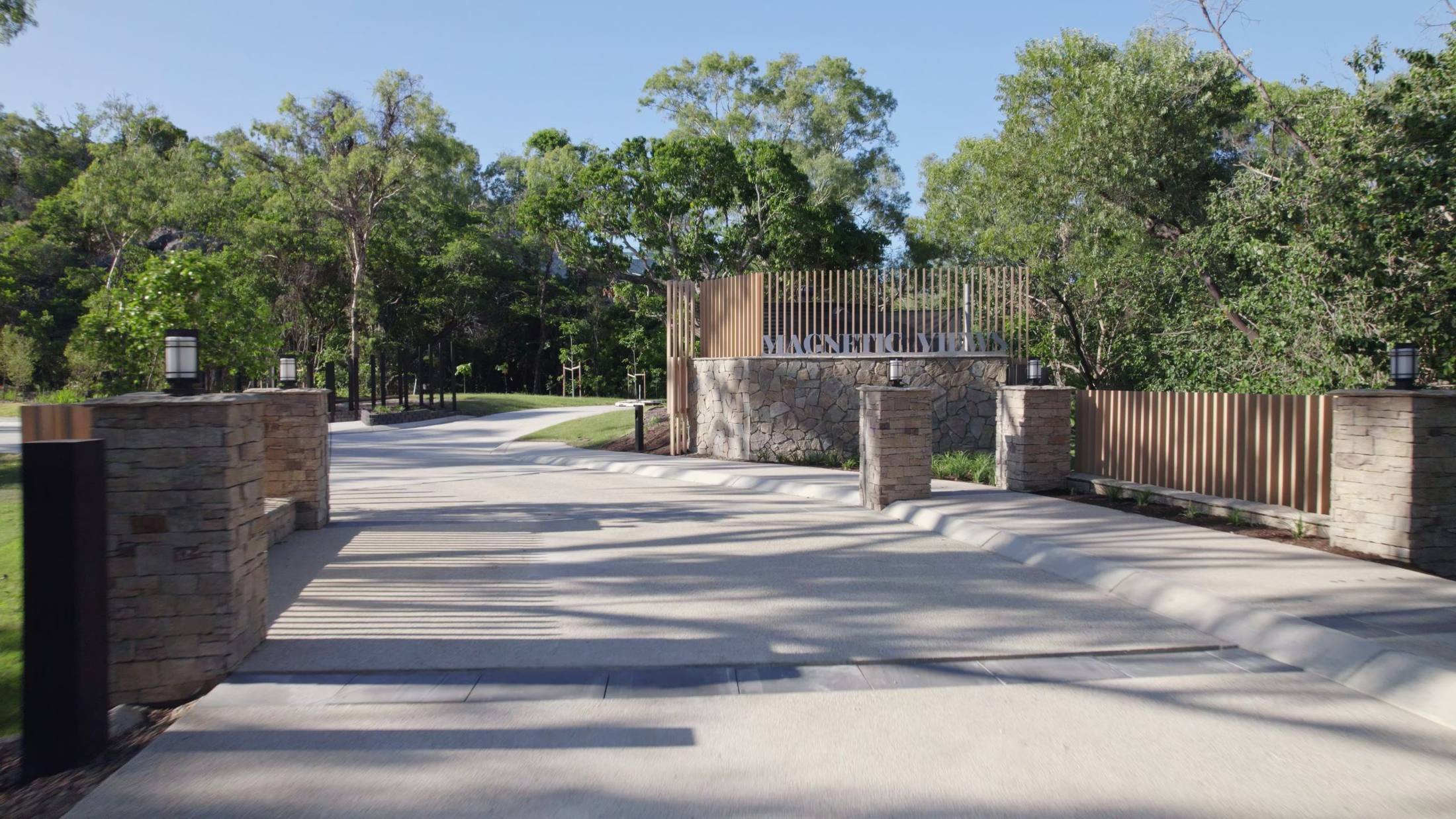 The stone and timber entry gates at Magnetic Views Estate